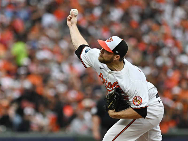 Oct 1, 2024; Baltimore, Maryland, USA; Baltimore Orioles pitcher Corbin Burnes (39) throws a pitch in the second inning against the Kansas City Royals in game one of the Wild Card round for the 2024 MLB Playoffs at Oriole Park at Camden Yards. Mandatory Credit: Tommy Gilligan-Imagn Images