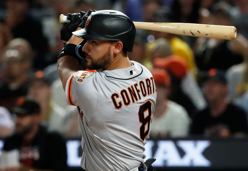 Jul 15, 2023; Pittsburgh, Pennsylvania, USA;  San Francisco Giants right fielder Michael Conforto (8) hits an RBI single against the Pittsburgh Pirates during the eighth inning at PNC Park. Mandatory Credit: Charles LeClaire-USA TODAY Sports