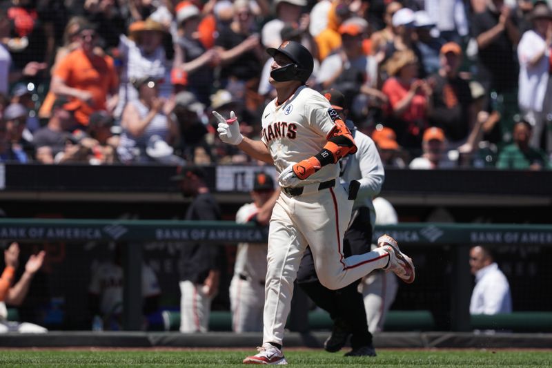 Jun 2, 2024; San Francisco, California, USA; San Francisco Giants shortstop Casey Schmitt (10) gestures while rounding the bases after hitting a home run against the New York Yankees during the fourth inning at Oracle Park. Mandatory Credit: Darren Yamashita-USA TODAY Sports