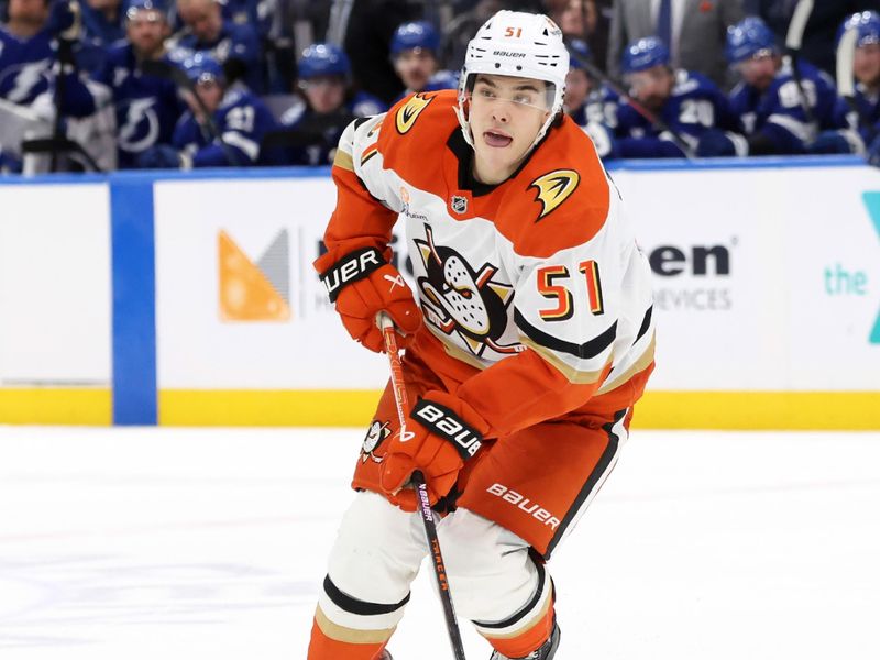 Jan 16, 2025; Tampa, Florida, USA; Anaheim Ducks defenseman Olen Zellweger (51) skates with the puck against the Tampa Bay Lightning during overtime at Amalie Arena. Mandatory Credit: Kim Klement Neitzel-Imagn Images