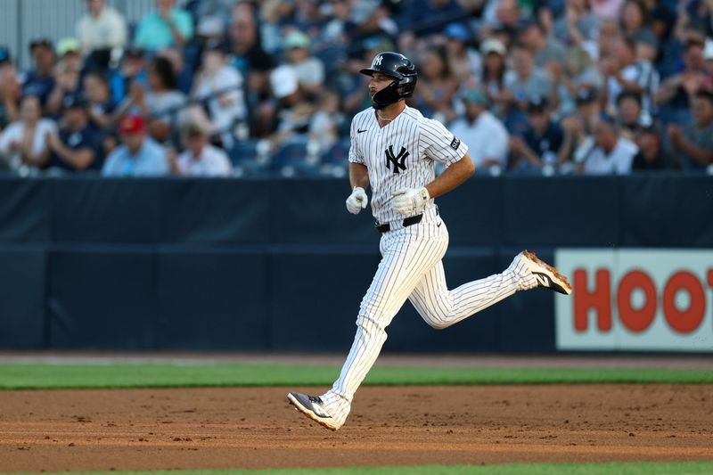 Mar 9, 2026; Tampa, Florida, USA; New York Yankees third baseman Paul DeJong (18) runs the bases after hitting a home run against the Pittsburgh Pirates in the third inning during spring training at George M. Steinbrenner Field. Mandatory Credit: Nathan Ray Seebeck-Imagn Images