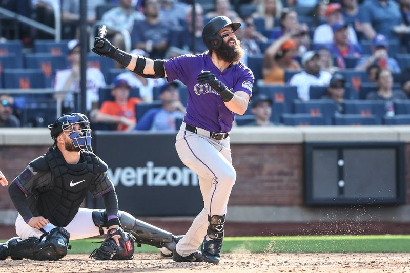 Jul 13, 2024; New York City, New York, USA;  Colorado Rockies designated hitter Charlie Blackmon (19) hits a two run home run in the fifth inning against the New York Mets at Citi Field. Mandatory Credit: Wendell Cruz-USA TODAY Sports