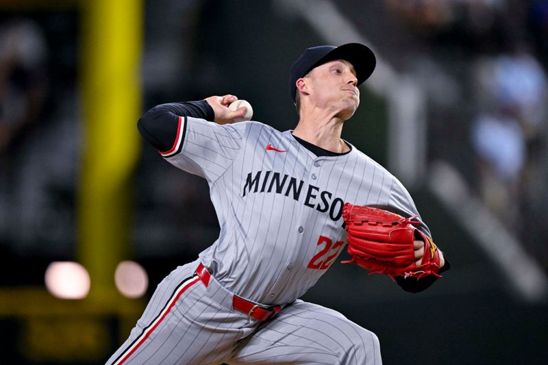 Aug 15, 2024; Arlington, Texas, USA; Minnesota Twins relief pitcher Griffin Jax (22) pitches against the Texas Rangers during the game at Globe Life Field. Mandatory Credit: Jerome Miron-USA TODAY Sports