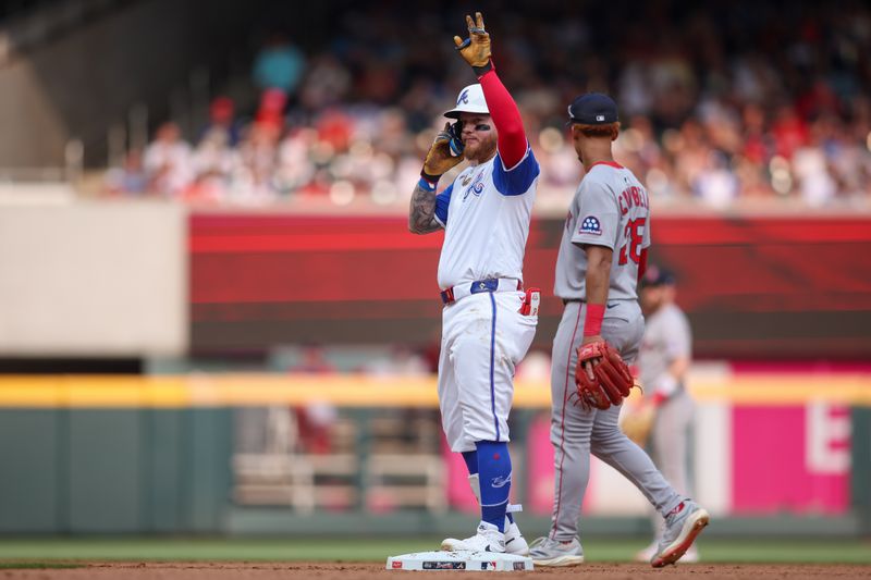 May 31, 2025; Atlanta, Georgia, USA; Atlanta Braves left fielder Alex Verdugo (8) celebrates after a double against the Boston Red Sox in the eighth inning at Truist Park. Mandatory Credit: Brett Davis-Imagn Images

