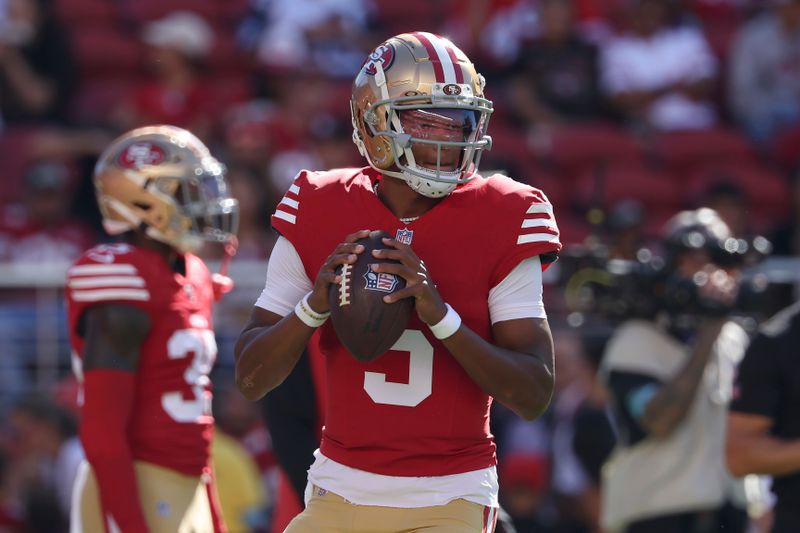 San Francisco 49ers quarterback Joshua Dobbs (5) warms up before a preseason NFL football game against the New Orleans Saints in Santa Clara, Calif., Sunday, Aug. 18, 2024. (AP Photo/Jed Jacobsohn)