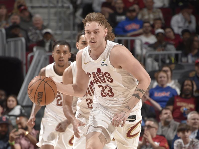 CLEVELAND, OH - APRIL 13: Luke Travers #33 of the Cleveland Cavaliers dribbles the ball during the game against the Indiana Pacers  on April 13, 2025 at Rocket Arena in Cleveland, Ohio. NOTE TO USER: User expressly acknowledges and agrees that, by downloading and/or using this Photograph, user is consenting to the terms and conditions of the Getty Images License Agreement. Mandatory Copyright Notice: Copyright 2025 NBAE (Photo by David Liam Kyle/NBAE via Getty Images)