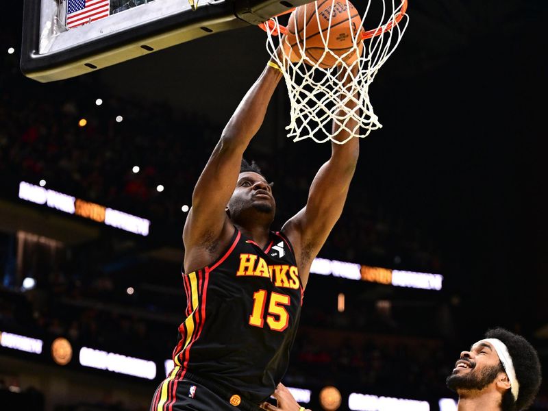 ATLANTA, GA - NOVEMBER 29: Clint Capela #15 of the Atlanta Hawks dunks the ball during the game against the Cleveland Cavaliers during the Emirates NBA Cup game on November 29, 2024 at State Farm Arena in Atlanta, Georgia.  NOTE TO USER: User expressly acknowledges and agrees that, by downloading and/or using this Photograph, user is consenting to the terms and conditions of the Getty Images License Agreement. Mandatory Copyright Notice: Copyright 2024 NBAE (Photo by Adam Hagy/NBAE via Getty Images)