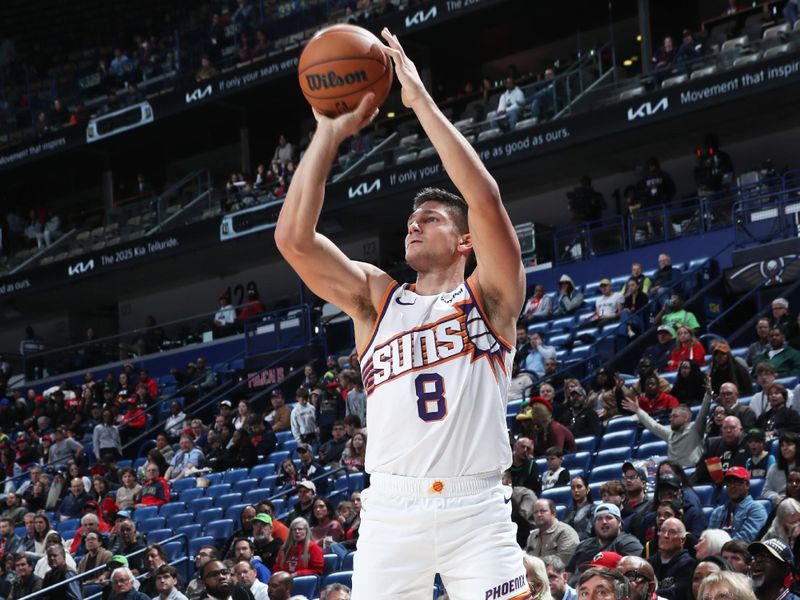 NEW ORLEANS, LA - DECEMBER 5: Grayson Allen #8 of the Phoenix Suns shoots a three point basket during the game against the New Orleans Pelicans on December 5, 2024 at the Smoothie King Center in New Orleans, Louisiana. NOTE TO USER: User expressly acknowledges and agrees that, by downloading and or using this Photograph, user is consenting to the terms and conditions of the Getty Images License Agreement. Mandatory Copyright Notice: Copyright 2024 NBAE (Photo by Layne Murdoch Jr./NBAE via Getty Images)