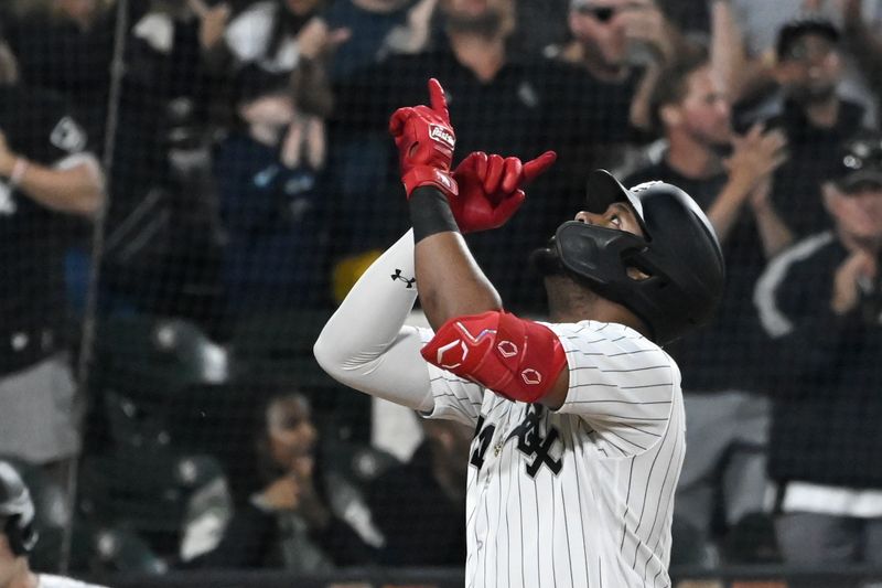 Jul 6, 2023; Chicago, Illinois, USA;  Chicago White Sox designated hitter Eloy Jimenez (74) gestures after he hits a two run home run against the Toronto Blue Jays during the third inning at Guaranteed Rate Field. Mandatory Credit: Matt Marton-USA TODAY Sports