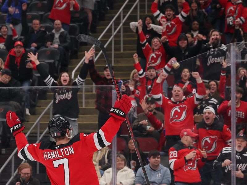 Mar 3, 2026; Newark, New Jersey, USA; New Jersey Devils defenseman Dougie Hamilton (7) celebrates his goal against the Florida Panthers during the second period at Prudential Center. Mandatory Credit: Ed Mulholland-Imagn Images