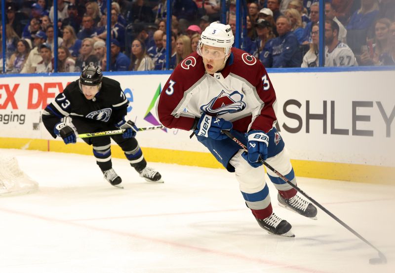 Feb 15, 2024; Tampa, Florida, USA; Colorado Avalanche defenseman Jack Johnson (3) skates with the puck as Tampa Bay Lightning left wing Conor Sheary (73) defends during the first period at Amalie Arena. Mandatory Credit: Kim Klement Neitzel-USA TODAY Sports