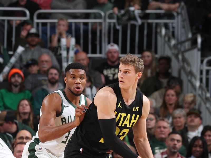 MILWAUKEE, WI - NOVEMBER 7: Lauri Markkanen #23 of the Utah Jazz handles the ball during the game against the Milwaukee Bucks on November 7, 2024 at Fiserv Forum Center in Milwaukee, Wisconsin. NOTE TO USER: User expressly acknowledges and agrees that, by downloading and or using this Photograph, user is consenting to the terms and conditions of the Getty Images License Agreement. Mandatory Copyright Notice: Copyright 2024 NBAE (Photo by Gary Dineen/NBAE via Getty Images).