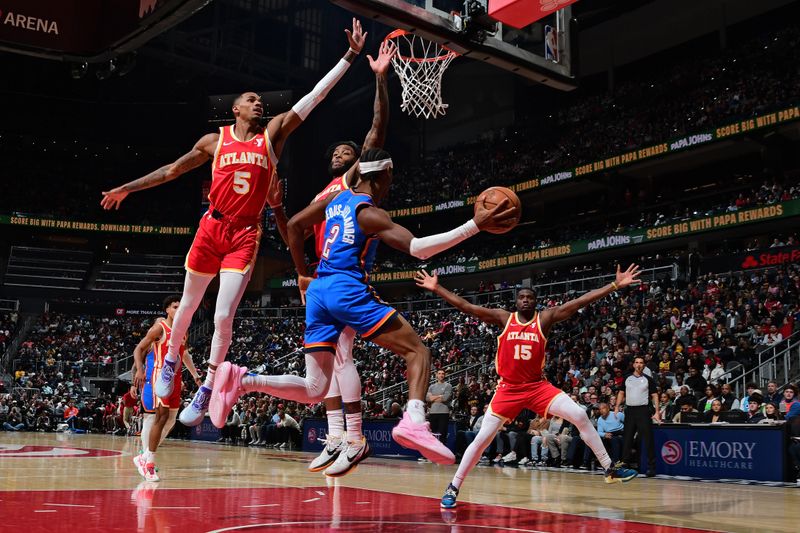 ATLANTA, GA - JANUARY 3: Shai Gilgeous-Alexander #2 of the Oklahoma City Thunder looks to pass the ball during the game against the Atlanta Hawks on January 3, 2024 at State Farm Arena in Atlanta, Georgia.  NOTE TO USER: User expressly acknowledges and agrees that, by downloading and/or using this Photograph, user is consenting to the terms and conditions of the Getty Images License Agreement. Mandatory Copyright Notice: Copyright 2024 NBAE (Photo by Scott Cunningham/NBAE via Getty Images)