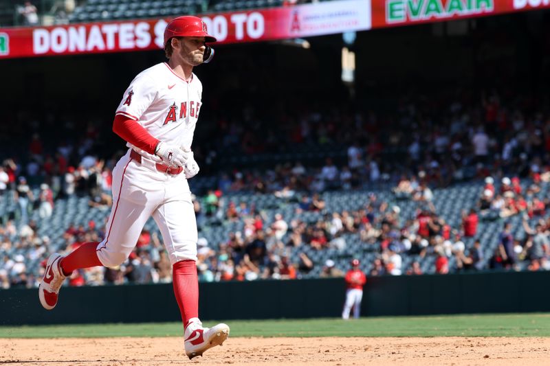 Sep 15, 2024; Anaheim, California, USA;  Los Angeles Angels left fielder Taylor Ward (3) runs the bases on a home run during the eighth inning against the Houston Astros at Angel Stadium. Mandatory Credit: Kiyoshi Mio-Imagn Images