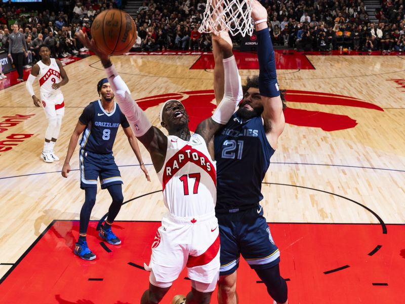 TORONTO, CANADA - JANUARY 22: Dennis Schroder #17 of the Toronto Raptors drives to the basket during the game against the Memphis Grizzlies on January 22, 2024 at the Scotiabank Arena in Toronto, Ontario, Canada.  NOTE TO USER: User expressly acknowledges and agrees that, by downloading and or using this Photograph, user is consenting to the terms and conditions of the Getty Images License Agreement.  Mandatory Copyright Notice: Copyright 2024 NBAE (Photo by Mark Blinch/NBAE via Getty Images)