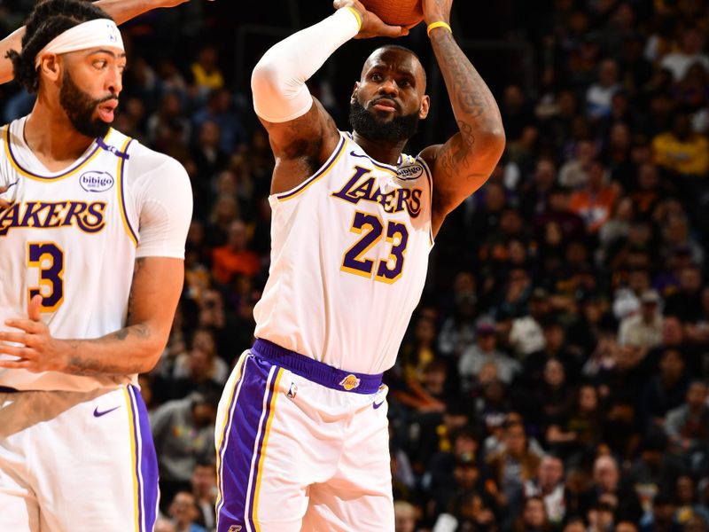 PHOENIX, AZ - NOVEMBER 26: LeBron James #23 of the Los Angeles Lakers shoots the ball during the game against the Phoenix Suns during the Emirates NBA Cup game on November 26, 2024 at Footprint Center in Phoenix, Arizona. NOTE TO USER: User expressly acknowledges and agrees that, by downloading and or using this photograph, user is consenting to the terms and conditions of the Getty Images License Agreement. Mandatory Copyright Notice: Copyright 2024 NBAE (Photo by Barry Gossage/NBAE via Getty Images)