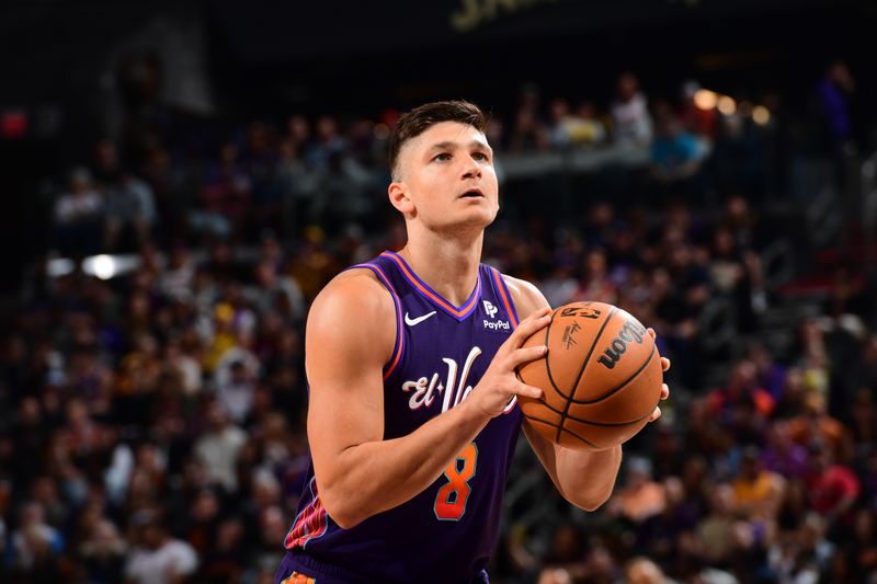 PHOENIX, AZ - FEBRUARY 25: Grayson Allen #8 of the Phoenix Suns shoots a free throw during the game against the Los Angeles Lakers on February 25, 2024 at Footprint Center in Phoenix, Arizona. NOTE TO USER: User expressly acknowledges and agrees that, by downloading and or using this photograph, user is consenting to the terms and conditions of the Getty Images License Agreement. Mandatory Copyright Notice: Copyright 2024 NBAE (Photo by Kate Frese/NBAE via Getty Images)