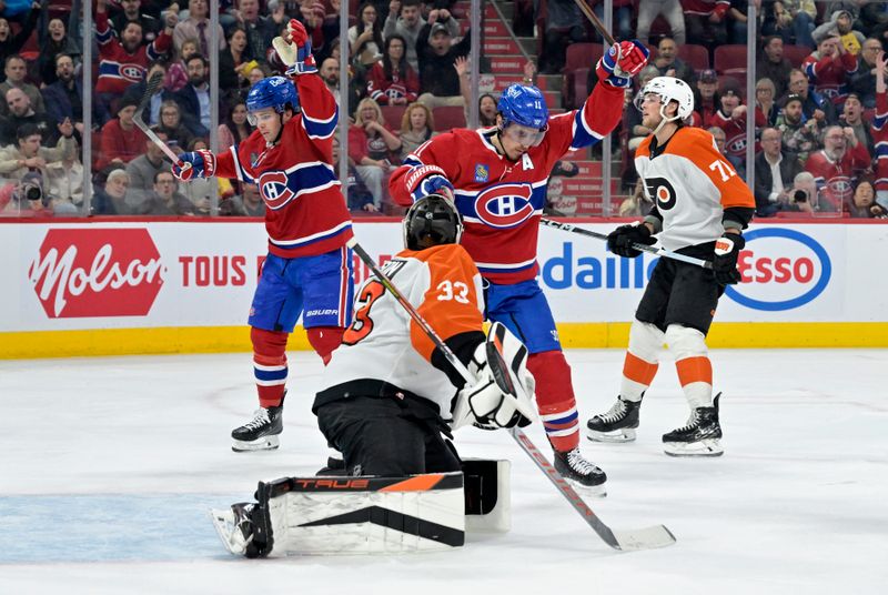 Apr 9, 2024; Montreal, Quebec, CAN; Montreal Canadiens forward Brendan Gallagher (11) celebrates with teammate  forward Alex Newhook (15) after scoring a goal against Philadelphia Flyers goalie Samuel Ersson (33) during the second period at the Bell Centre. Mandatory Credit: Eric Bolte-USA TODAY Sports