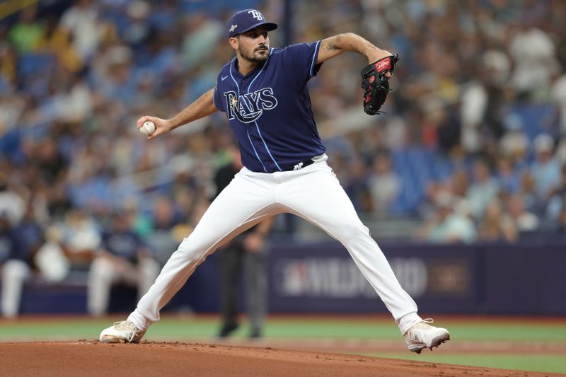 Oct 4, 2023; St. Petersburg, Florida, USA; Tampa Bay Rays starting pitcher Zach Eflin (24) pitches against the Texas Rangers in the first inning during game two of the Wildcard series for the 2023 MLB playoffs at Tropicana Field. Mandatory Credit: Nathan Ray Seebeck-USA TODAY Sports