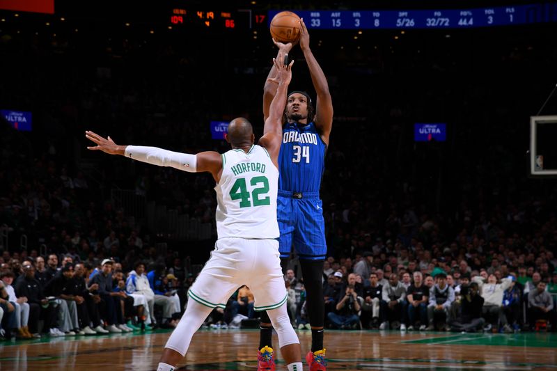 BOSTON, MA - JANUARY 17: Wendell Carter Jr. #34 of the Orlando Magic shoots the ball during the game against the Boston Celtics on January 17, 2025 at TD Garden in Boston, Massachusetts. NOTE TO USER: User expressly acknowledges and agrees that, by downloading and/or using this Photograph, user is consenting to the terms and conditions of the Getty Images License Agreement. Mandatory Copyright Notice: Copyright 2025 NBAE (Photo by Brian Babineau/NBAE via Getty Images)