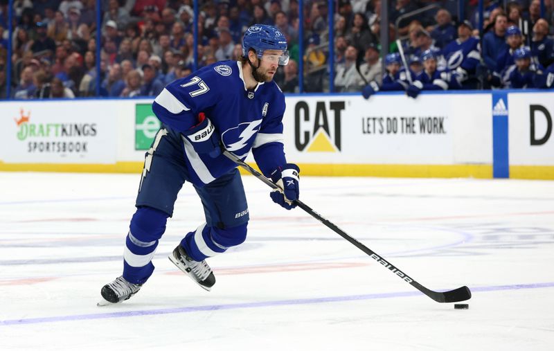 Apr 27, 2024; Tampa, Florida, USA; Tampa Bay Lightning defenseman Victor Hedman (77) skates with the puck against the Florida Panthers during the first period in game four of the first round of the 2024 Stanley Cup Playoffs at Amalie Arena. Mandatory Credit: Kim Klement Neitzel-USA TODAY Sports