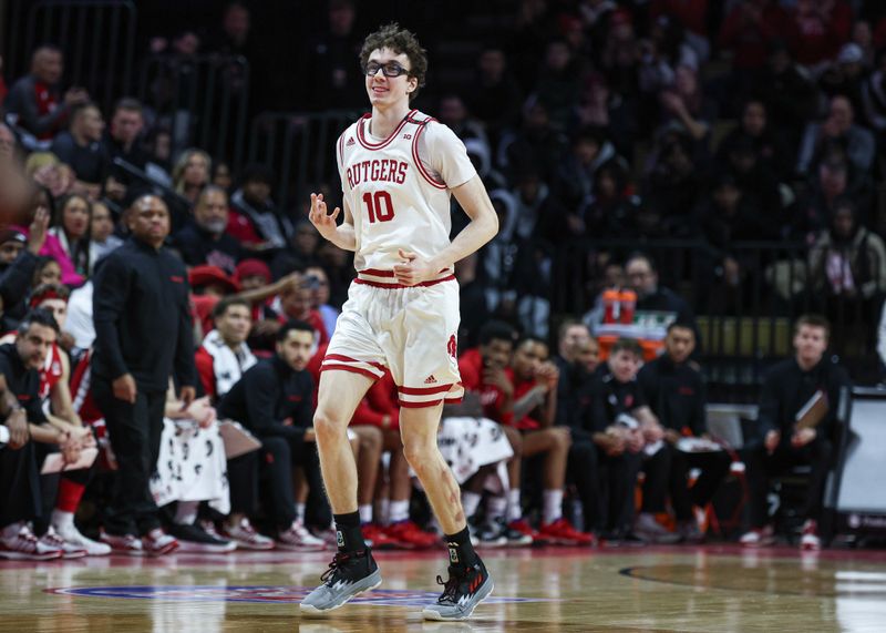 Jan 17, 2024; Piscataway, New Jersey, USA; Rutgers Scarlet Knights guard Gavin Griffiths (10) reacts after making a three point basket during the second half against the Nebraska Cornhuskers  at Jersey Mike's Arena. Mandatory Credit: Vincent Carchietta-USA TODAY Sports