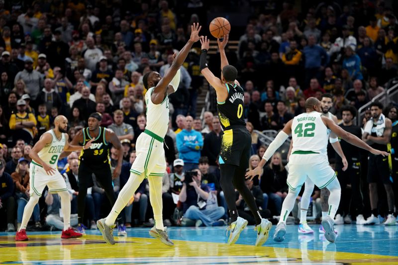INDIANAPOLIS, INDIANA - DECEMBER 04: Tyrese Haliburton #0 of the Indiana Pacers attempts a shot while being guarded by Jaylen Brown #7 of the Boston Celtics in the fourth quarter during the NBA In-Season Tournament at Gainbridge Fieldhouse on December 04, 2023 in Indianapolis, Indiana. NOTE TO USER: User expressly acknowledges and agrees that, by downloading and or using this photograph, User is consenting to the terms and conditions of the Getty Images License Agreement. (Photo by Dylan Buell/Getty Images)