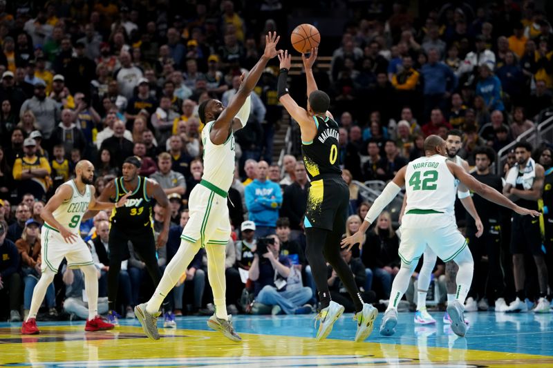 INDIANAPOLIS, INDIANA - DECEMBER 04: Tyrese Haliburton #0 of the Indiana Pacers attempts a shot while being guarded by Jaylen Brown #7 of the Boston Celtics in the fourth quarter during the NBA In-Season Tournament at Gainbridge Fieldhouse on December 04, 2023 in Indianapolis, Indiana. NOTE TO USER: User expressly acknowledges and agrees that, by downloading and or using this photograph, User is consenting to the terms and conditions of the Getty Images License Agreement. (Photo by Dylan Buell/Getty Images)