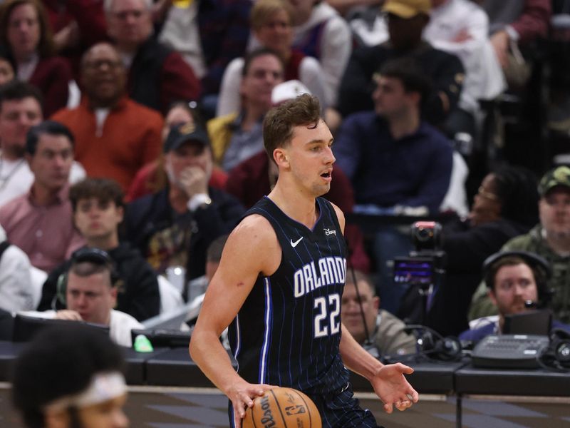 CLEVELAND, OH - APRIL 22: Franz Wagner #22 of the Orlando Magic dribbles the ball during the game against the Cleveland Cavaliers during Round 1 Game 2 of the 2024 NBA Playoffs on April 22, 2024 at Rocket Mortgage FieldHouse in Cleveland, Ohio. NOTE TO USER: User expressly acknowledges and agrees that, by downloading and/or using this Photograph, user is consenting to the terms and conditions of the Getty Images License Agreement. Mandatory Copyright Notice: Copyright 2024 NBAE (Photo by Lauren Leigh Bacho/NBAE via Getty Images)