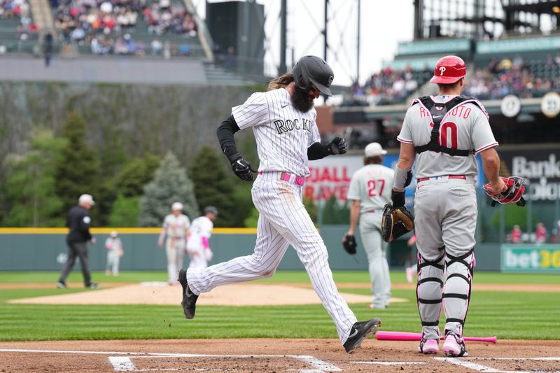 May 14, 2023; Denver, Colorado, USA; Colorado Rockies designated hitter Charlie Blackmon (19) scores a run in the first inning against the Philadelphia Phillies at Coors Field. Mandatory Credit: Ron Chenoy-USA TODAY Sports