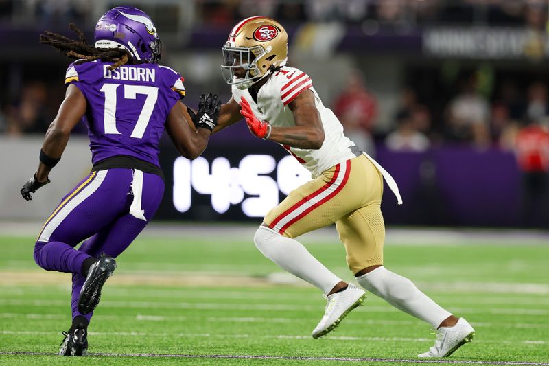 Minnesota Vikings wide receiver K.J. Osborn (17) in action against San Francisco 49ers cornerback Charvarius Ward (7) during the first half of an NFL football game Monday, Oct. 23, 2023 in Minneapolis. (AP Photo/Stacy Bengs)