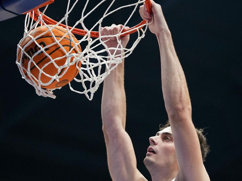  Nov 6, 2023; Lawrence, Kansas, USA; Kansas Jayhawks forward Parker Braun (23) dunks the ball during the first half against the North Carolina Central Eagles at Allen Fieldhouse. Mandatory Credit: Jay Biggerstaff-USA TODAY Sports