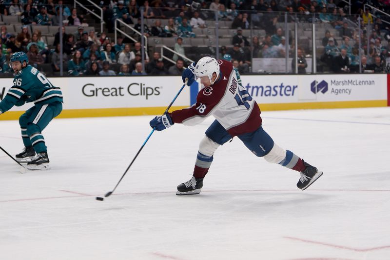 Nov 1, 2025; San Jose, California, USA; Colorado Avalanche center Jack Drury (18) takes a shot against the San Jose Sharks during the second period at SAP Center at San Jose. Mandatory Credit: Dennis Lee-Imagn Images