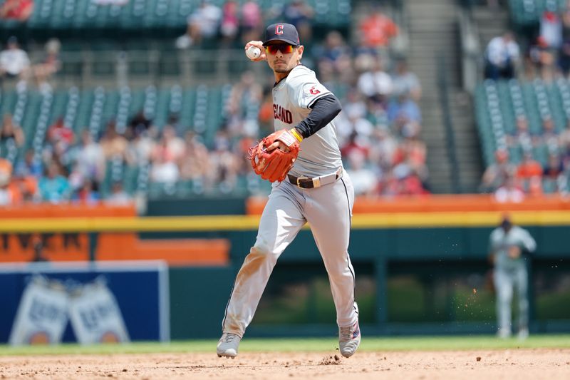 Jul 11, 2024; Detroit, Michigan, USA;  Cleveland Guardians second base Andres Gimeez (0) makes a throw in the fifth inning against the Detroit Tigers at Comerica Park. Mandatory Credit: Rick Osentoski-USA TODAY Sports