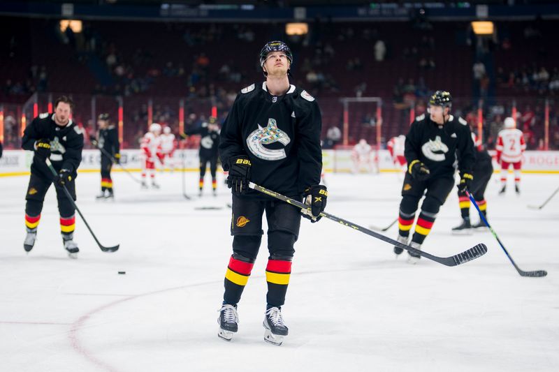 Feb 13, 2023; Vancouver, British Columbia, CAN; Vancouver Canucks forward Elias Pettersson (40) looks up during warm up prior to a game against the Detroit Red Wings at Rogers Arena. Mandatory Credit: Bob Frid-USA TODAY Sports