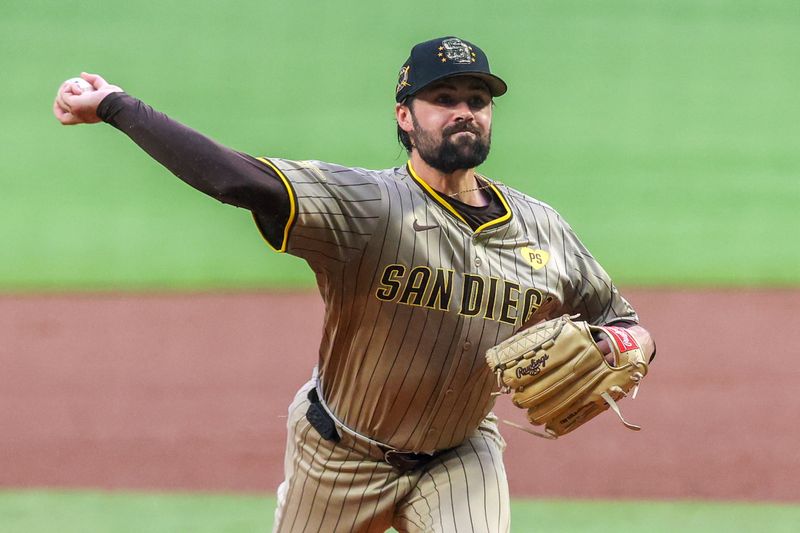 May 17, 2024; Atlanta, Georgia, USA; San Diego Padres starting pitcher Matt Waldron (61) throws against the Atlanta Braves in the first inning at Truist Park. Mandatory Credit: Brett Davis-USA TODAY Sports