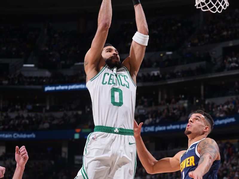 DENVER, CO - JANUARY 7: Jayson Tatum #0 of the Boston Celtics drives to the basket during the game against the Denver Nuggets on January 7, 2025 at Ball Arena in Denver, Colorado. NOTE TO USER: User expressly acknowledges and agrees that, by downloading and/or using this Photograph, user is consenting to the terms and conditions of the Getty Images License Agreement. Mandatory Copyright Notice: Copyright 2025 NBAE (Photo by Bart Young/NBAE via Getty Images)