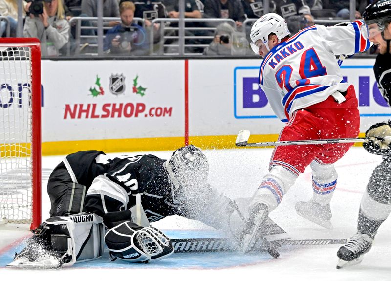 Nov 22, 2022; Los Angeles, California, USA;  Los Angeles Kings goaltender Cal Petersen (40) makes a save off a shot on goal by New York Rangers right wing Kaapo Kakko (24) in the third period at Crypto.com Arena. Mandatory Credit: Jayne Kamin-Oncea-USA TODAY Sports