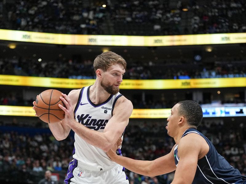 DALLAS, TX - JANUARY 27: Domantas Sabonis #10 of the Sacramento Kings handles the ball during the game  on January 27, 2024 at the American Airlines Center in Dallas, Texas. NOTE TO USER: User expressly acknowledges and agrees that, by downloading and or using this photograph, User is consenting to the terms and conditions of the Getty Images License Agreement. Mandatory Copyright Notice: Copyright 2024 NBAE (Photo by Glenn James/NBAE via Getty Images)