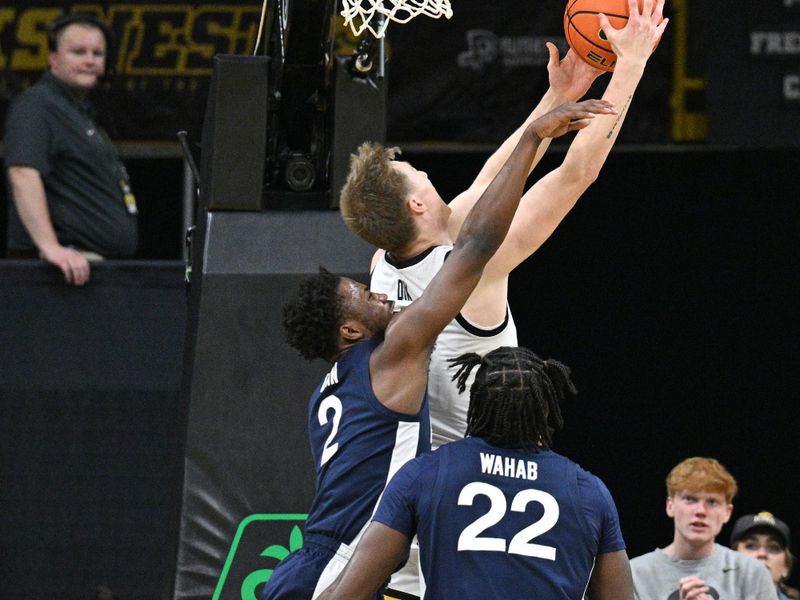 Feb 27, 2024; Iowa City, Iowa, USA; Iowa Hawkeyes guard Josh Dix (4) goes to the basket as Penn State Nittany Lions guard D'Marco Dunn (2) and forward Qudus Wahab (22) defend during the first half at Carver-Hawkeye Arena. Mandatory Credit: Jeffrey Becker-USA TODAY Sports