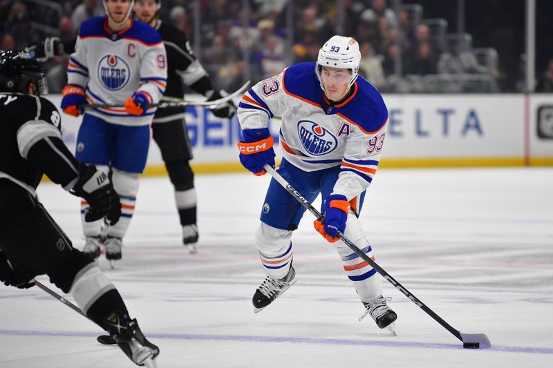 Dec 30, 2023; Los Angeles, California, USA; Edmonton Oilers center Ryan Nugent-Hopkins (93) moves in for a shot against the Los Angeles Kings during the first period at Crypto.com Arena. Mandatory Credit: Gary A. Vasquez-USA TODAY Sports