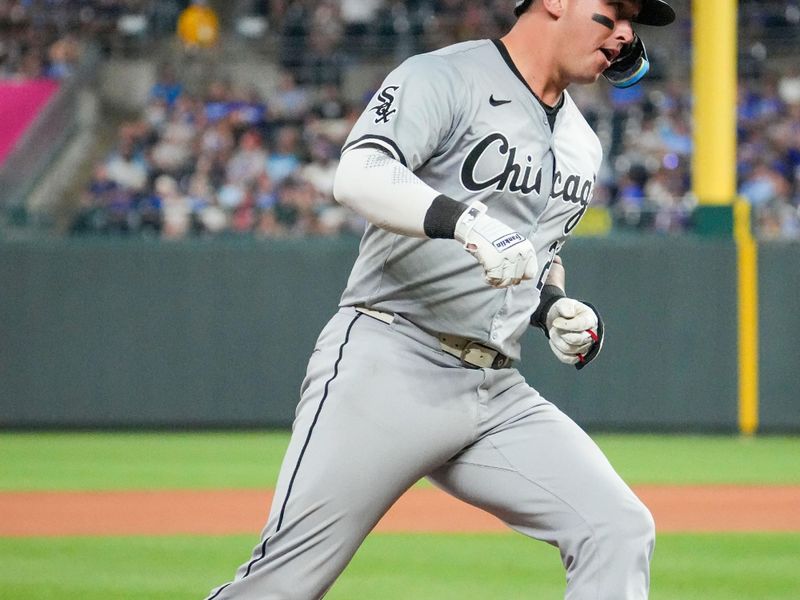 Jul 19, 2024; Kansas City, Missouri, USA; Chicago White Sox catcher Korey Lee (26) celebrates while running the bases after hitting a solo home run abasing the Kansas City Royals in the eighth inning at Kauffman Stadium. Mandatory Credit: Denny Medley-USA TODAY Sports