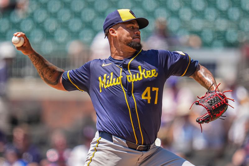 Aug 8, 2024; Cumberland, Georgia, USA; Milwaukee Brewers starting pitcher Frankie Montas (47) pitches against the Atlanta Braves  during the second inning at Truist Park. Mandatory Credit: Dale Zanine-USA TODAY Sports