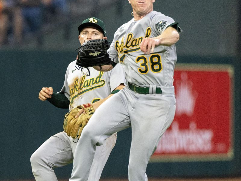 Sep 12, 2023; Houston, Texas, USA; Oakland Athletics starting pitcher JP Sears (38) catches Houston Astros second baseman Jose Altuve (27) (not pictured) fly ball for an out and then picked off catcher Martin Maldonado (15) (not pictured) at first base in the fifth inning at Minute Maid Park. Mandatory Credit: Thomas Shea-USA TODAY Sports