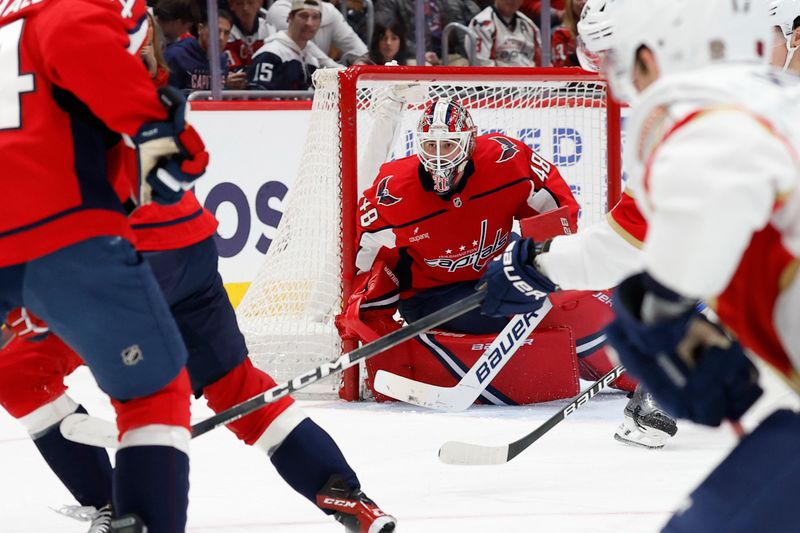 Jan 17, 2026; Washington, District of Columbia, USA; Washington Capitals goaltender Logan Thompson (48) follows the puck against the Florida Panthers during the second period at Capital One Arena. Mandatory Credit: Geoff Burke-Imagn Images