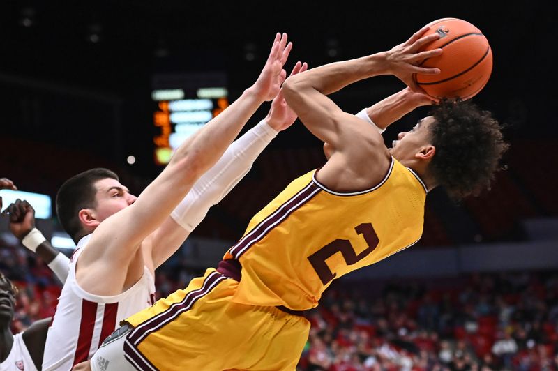 Jan 28, 2023; Pullman, Washington, USA; Arizona State Sun Devils guard Austin Nunez (2) shoots the ball against Washington State Cougars forward Andrej Jakimovski (23) in the second half at Friel Court at Beasley Coliseum. Washington State won 75-58. Mandatory Credit: James Snook-USA TODAY Sports