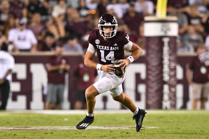 Sep 2, 2023; College Station, Texas, USA; Texas A&M Aggies quarterback Max Johnson (14) runs the ball during the fourth quarter against New Mexico Lobos at Kyle Field. Mandatory Credit: Maria Lysaker-USA TODAY Sports