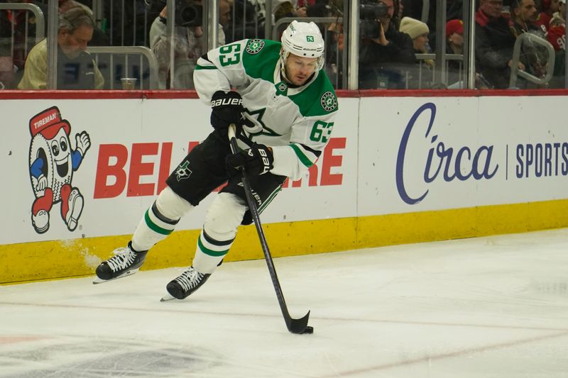 Nov 27, 2024; Chicago, Illinois, USA; Dallas Stars right wing Evgenii Dadonov (63) skates against the Chicago Blackhawks during the first period at United Center. Mandatory Credit: David Banks-Imagn Images