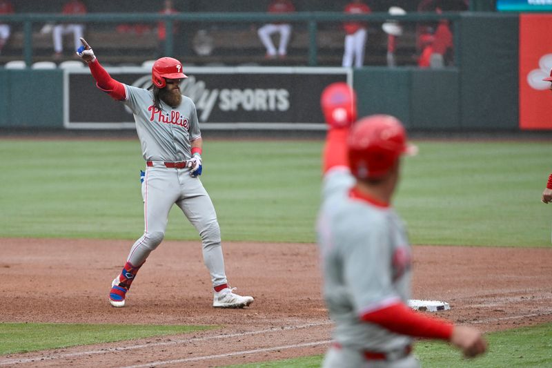 Apr 10, 2024; St. Louis, Missouri, USA;  Philadelphia Phillies left fielder Brandon Marsh (16) reacts after hitting a one run single against the St. Louis Cardinals during the sixth inning at Busch Stadium. Mandatory Credit: Jeff Curry-USA TODAY Sports