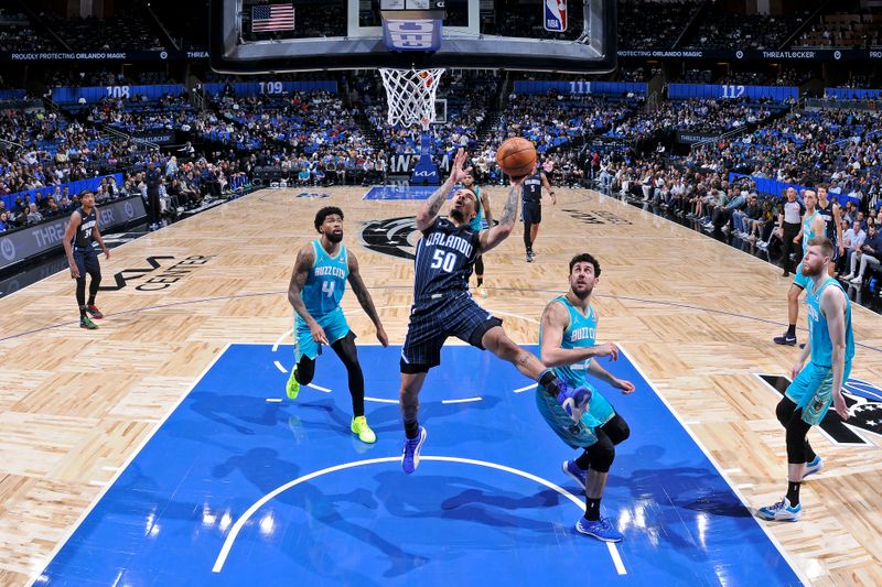 ORLANDO, FL - MARCH 19: Cole Anthony #50 of the Orlando Magic drives to the basket during the game against the Charlotte Hornets on March 19, 2024 at the Kia Center in Orlando, Florida. NOTE TO USER: User expressly acknowledges and agrees that, by downloading and or using this photograph, User is consenting to the terms and conditions of the Getty Images License Agreement. Mandatory Copyright Notice: Copyright 2024 NBAE (Photo by Fernando Medina/NBAE via Getty Images)